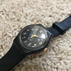 Swatch black & gold watch